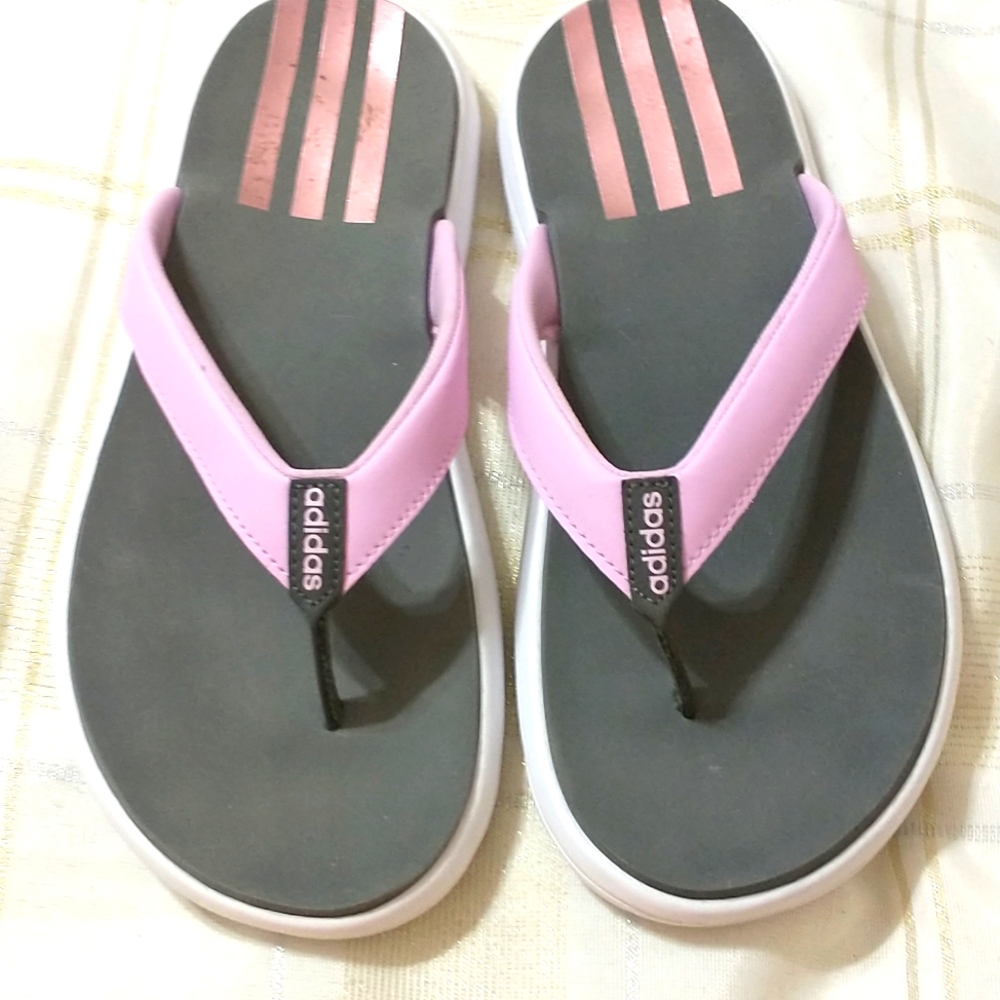 Ladies Adidas flip flops orchid gray and white one maybe one or two times